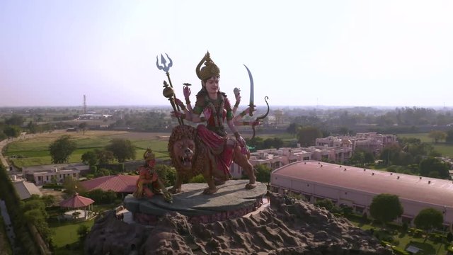 Aerial view on Durga temple statue in Vrindavan, India  4k drone view
