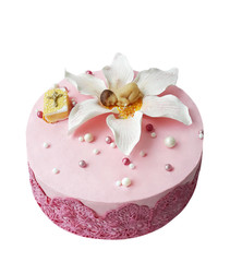 cake with edible lace and a flower of mastic on which the baby figure lies.