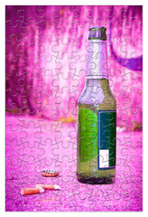 Puzzle of a bottle of beer resting on the ground - Free themselves from alcohol addiction