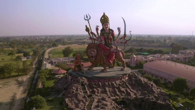 Aerial view on Durga temple statue in Vrindavan, India  4k drone view