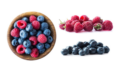 Ripe raspberries and blueberries isolated on white background. Background of mix berries with copy space for text. Mix berries isolated on a white background. Various fresh summer.
