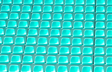 Naklejka premium Empty green plastic chairs in a row at the football stadium