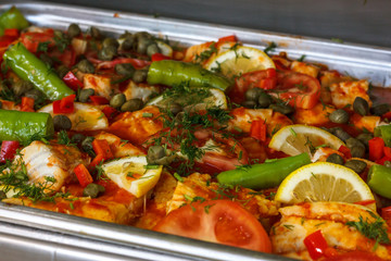 Baked vegetables with meat in a clay pan