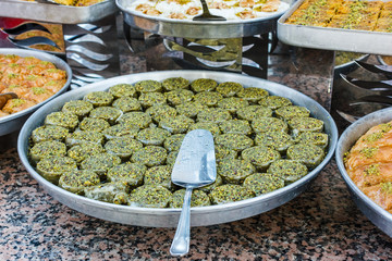 Traditional Turkish baklava sweets in the open buffet in a hotel in Turkey
