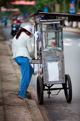 female oriental street vendor