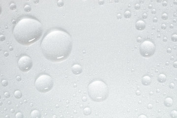 Drops of water on white surface
