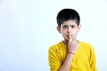 young indian  cute child shush expression
