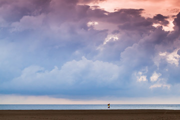 Cloudy tropical sky over sandy beach