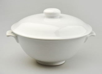Large ceramic tureen on a gray background