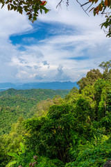 Blue sky high peak mountains fog hills mist scenery national park views at Phu Tub Berk, Khao Koh, Phetchabun Province, Thailand