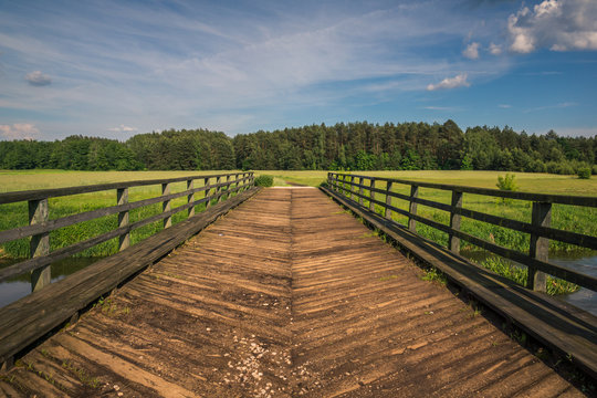 Wooden bridge over the Radomka river, Masovia, Poland