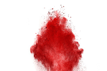 Red powder explosion on white background. Colored cloud. Colorful dust explode. Paint Holi.