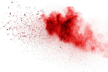 Red powder explosion on white background. Colored cloud. Colorful dust explode. Paint Holi.
