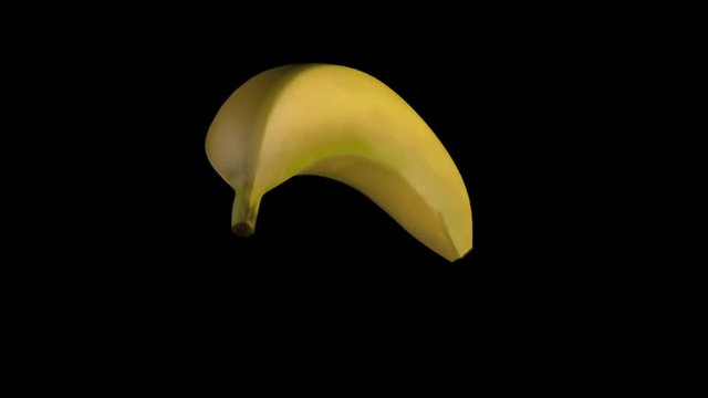 Animation of a spinning banana on a black background
