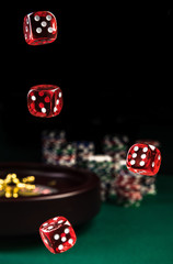 Throwing Red Dices , Casino and Poker Concept, Roulette in Background