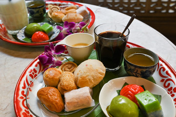 Varieties of Phuket local dessert with tea, coffee and almond milk, Thailand 