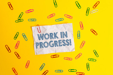 Text sign showing Work In Progress. Business photo showcasing unfinished project that still added...