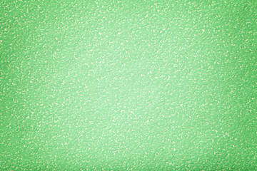 Texture of old green paper background, closeup. Structure of dense cardboard.