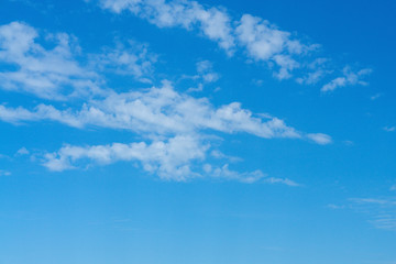Beautiful cirrus clouds on bright blue sky