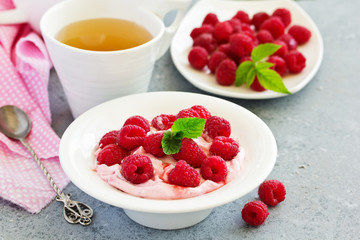 Creamy curd mousse with raspberries. Healthy breakfast.