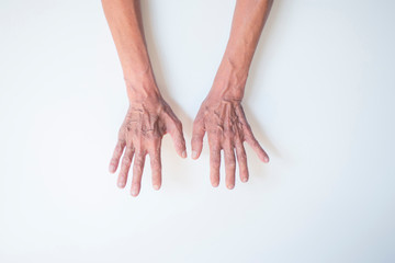 picture Old man's hand on a white background