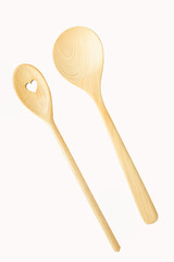 Items for the kitchen.Wooden spoons isolated on white background.