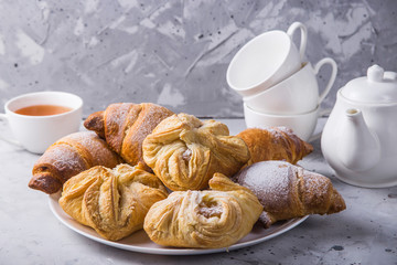 Baking puff pastry with a sweet filling for tea or lunch concept