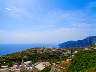 view to a small village in greece in the bay