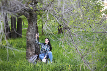 A girl travels the summer in the country