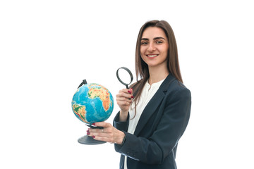 Young woman with globe in hat isolated on white