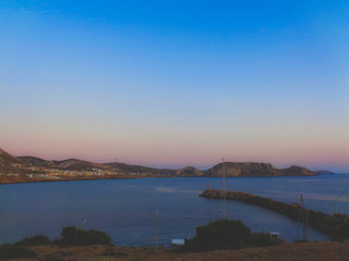 sunset at the bay in greece at summer