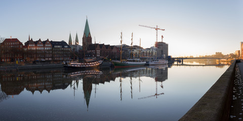 Panorama of Bremen at the Schlachte, St. Petri Dom, ships at sunrise
