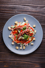 Salad with grilled sausage paprica cucumber and croutons