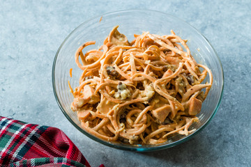 Spiralized Raw Sweet Potato Salad with Tahini / Tahin Sauce, Walnut and Cheese in Glass Bow.l.