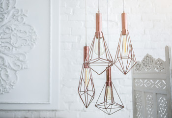 Loft style light chandelier. Interior ideas. Cosy home.