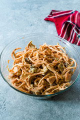 Spiralized Raw Sweet Potato Salad with Tahini / Tahin Sauce, Walnut and Cheese in Glass Bow.l.