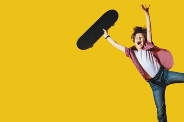 bright boy with skateboard © Andrey Kiselev