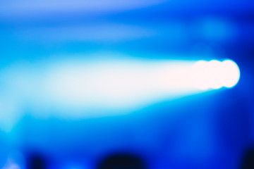 Blue spotlight glow sparkle rays lights for background/texture.