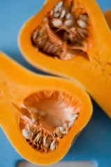 Halves of raw organic butternut squash