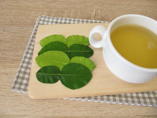 A cup of tea with kaffir lime leaves
