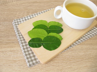 A cup of tea with kaffir lime leaves