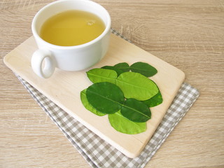 A cup of tea with kaffir lime leaves