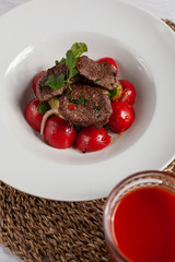 Top view of mini steaks with mashed potatoes and onion, served on white background