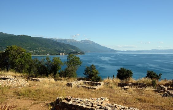 Coast of Lake Ochrid seen from Ochrid City. Ohrid and Lake Ohrid are UNESCO natural and cultural heritage sites. Typical Macedonian architecture. Amphitheater and old town.