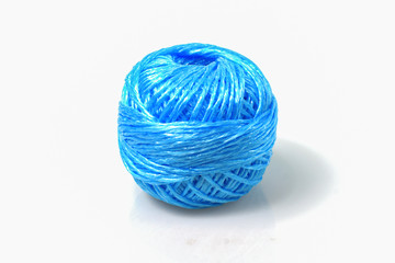 Ball of blue rope isolated on white background
