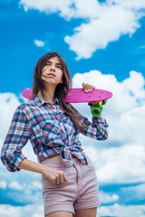 plastic mini cruiser board. Spring. Urban scene, city life. skateboard sport hobby. Summer...