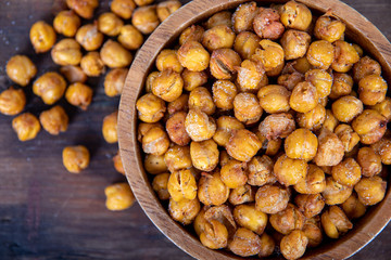 Roasted Chick Peas healthy snack on wooden table