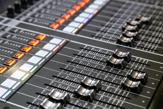 Professional audio mixer. Close up. Selective focus.