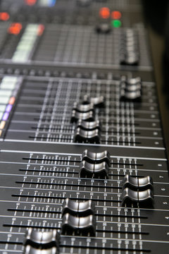 Professional audio mixer. Close up. Selective focus.