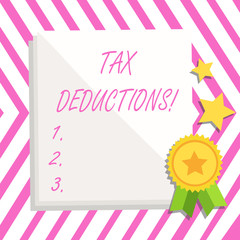 Writing note showing Tax Deductions. Business concept for Reduction on taxes Investment Savings Money Returns